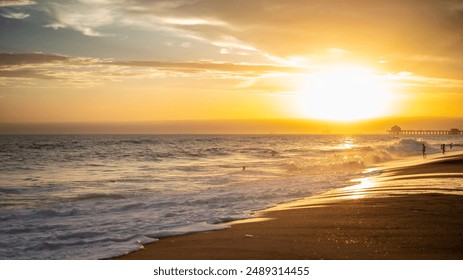 A stunning sunset with a picturesque sky over Huntington Beach, California