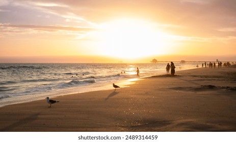 A stunning sunset with a picturesque sky over Huntington Beach, California