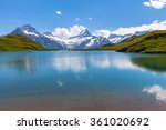 Stunning view of Bachalpsee and the snow coverd peaks with glacier of swiss alps, on Bernese Oberland, Switzerland.