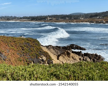 Stunning view of Big Sur, California, with rugged coastal cliffs, turquoise waves, and the iconic Bixby Creek Bridge under a clear sky. Lush hillsides and golden sunlight capture the natural beauty of - Powered by Shutterstock