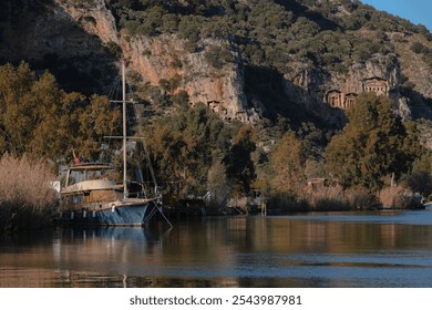 A stunning view of Dalyan, Turkey, featuring its serene river, lush landscapes, and ancient ruins. Perfect for nature and history lovers, capturing the beauty and heritage of this unique destination - Powered by Shutterstock