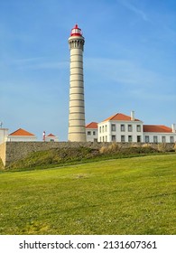 Stunning view of the famous Farol de Leca Lighthouse architecture building on Atlantic ocean coast and green meadow in Matosinhos, Portugal