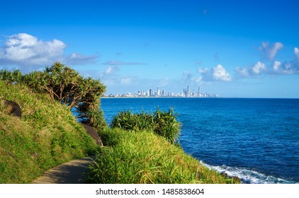 Stunning view of the Gold Coast skyline and surfing beach, visible from the walking track at Burleigh Heads Park, Queensland, Australia. 