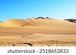 Stunning View of Huacachina Desert with a Dune Buggy Running, Ica Region of Peru, South America