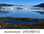 Stunning view on the Eqip Sermia, a famous and very active glacierin Greenland which declines fast due to climate change