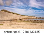 A stunning view of the Port Louis Citadelle wall located in Lorient, Brittany, France, showcasing its architectural grandeur by the coast.