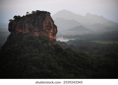 Stunning view of sigiriya, an ancient rock fortress, surrounded by lush greenery and mountains in sri lanka - Powered by Shutterstock