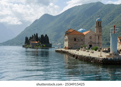 Stunning views of Kotor, Montenegro's historic coastal town, featuring medieval architecture, picturesque seashore, and majestic mountains. Perfect for travel, tourism, and nature photography. - Powered by Shutterstock