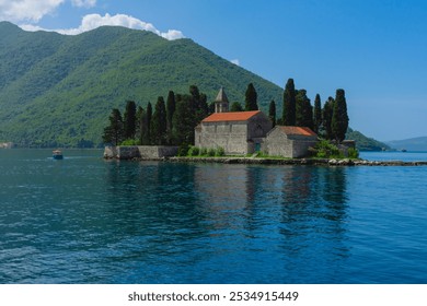 Stunning views of Kotor, Montenegro's historic coastal town, featuring medieval architecture, picturesque seashore, and majestic mountains. Perfect for travel, tourism, and nature photography. - Powered by Shutterstock