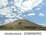 Stunning walk in Teotihuacan, city of the gods. Ancient citadel that preserves the fantastic pyramids, in an arid environment, and with dramatic skies to complete the magnificent view.
