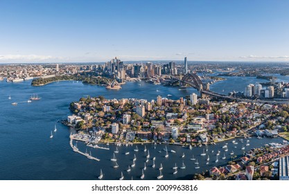 Stunning Wide Angle Panoramic Aerial Drone View Of The City Of Sydney, Australia Skyline With Harbour Bridge And Kirribilli Suburb In Foreground. Photo Shot In May 2021, Showing Newest Skyscrapers.