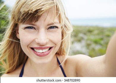 Stunning Young Blond Woman With Big Smile 