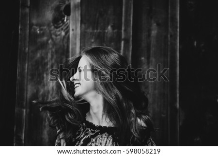 Similar – Image, Stock Photo Smiling girl with a hat pulling from her boyfriend hand in the street to take a walk.