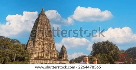 The stupa at Mahabodhi Temple Complex with blue sky in Bodh Gaya, India. 