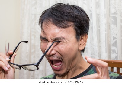 A Stupid Man Very Clumsy Accidentally Stab His Eye With Glasses Leg, Show Painful And Scream Out Emotional, Funny Accident