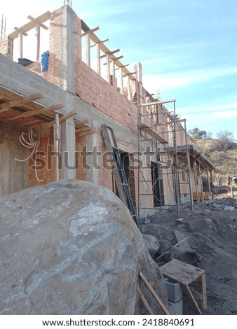 The sturdy concrete blocks rest on deep excavated foundations, creating a firm and unbreakable platform for your future home. This base will safely support the weight of the entire structure, giving y