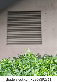 A sturdy metal roller shutter or rolling security door designed for commercial and industrial premises, featuring interlocking horizontal slats, a durable steel or aluminium construction, and a smooth rolling mechanism for secure closure. Ideal for shopfronts, warehouses, garages, and storage facilities.