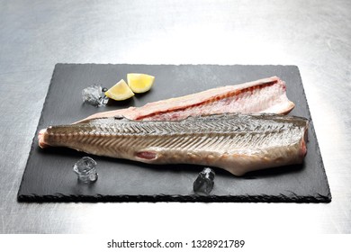 Sturgeon Fillet On A Stone Board.