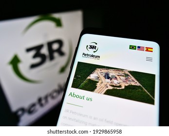Stuttgart, Germany - 02-28-2021: Mobile phone with website of Brazilian oil and gas company 3R Petroleum SA on screen in front of business logo. Focus on top-right of phone display. Unmodified photo.