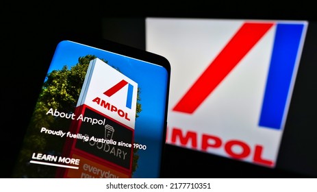 Stuttgart, Germany - 05-22-2021: Mobile Phone With Business Website Of Australian Oil, Fuel And Gas Company Ampol Limited On Screen In Front Of Logo. Focus On Top Of Phone Display. Unmodified Photo.