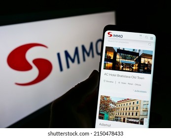 Stuttgart, Germany - 05-24-2021: Person Holding Cellphone With Webpage Of Austrian Real Estate Investment Company S IMMO AG On Screen With Logo. Focus On Top-left Of Phone Display. Unmodified Photo.