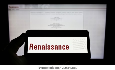 Stuttgart, Germany - 06-06-2022: Person Holding Mobile Phone With Logo Of American Hedge Fund Renaissance Technologies LLC On Screen In Front Of Web Page. Focus On Phone Display. Unmodified Photo.