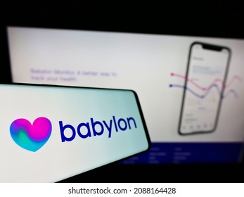 Stuttgart, Germany - 06-20-2021: Smartphone With Logo Of British Healthcare Company Babylon Health On Screen In Front Of Business Website. Focus On Center-right Of Phone Display. Unmodified Photo.