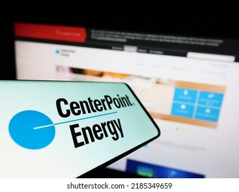 Stuttgart, Germany - 07-24-2022: Cellphone With Logo Of American Utility Company CenterPoint Energy Inc. On Screen In Front Of Website. Focus On Center-left Of Phone Display. Unmodified Photo.