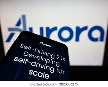 Stuttgart, Germany - 07-31-2021: Mobile Phone With Website Of US Self-driving Vehicle Company Aurora Innovation Inc. On Screen In Front Of Logo. Focus On Top-left Of Phone Display. Unmodified Photo.