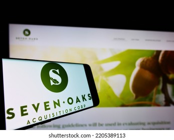 Stuttgart, Germany - 08-29-2021: Smartphone With Logo Of American Company Seven Oaks Acquisition Corp. On Screen In Front Of Business Website. Focus On Center Of Phone Display. Unmodified Photo.