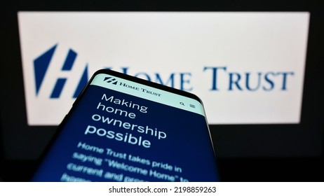 Stuttgart, Germany - 09-04-2022: Mobile Phone With Webpage Of Canadian Lender Home Trust Company On Screen In Front Of Business Logo. Focus On Top-left Of Phone Display. Unmodified Photo.