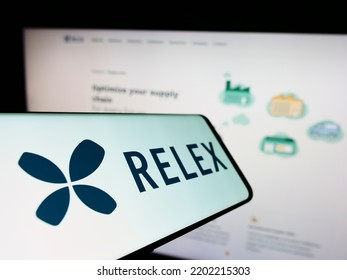 Stuttgart, Germany - 09-10-2022: Smartphone With Logo Of Finnish Software Company RELEX Solutions On Screen In Front Of Business Website. Focus On Center Of Phone Display. Unmodified Photo.