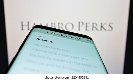 Stuttgart, Germany - 09-13-2022: Mobile Phone With Website Of British Investment Company Hambro Perks Limited On Screen In Front Of Logo. Focus On Top-left Of Phone Display. Unmodified Photo.