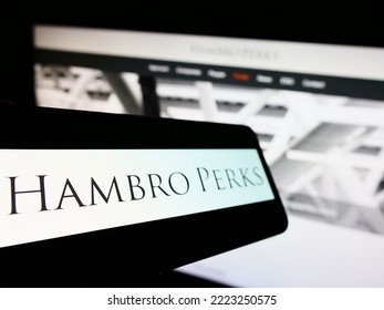 Stuttgart, Germany - 09-13-2022: Smartphone With Logo Of British Investment Company Hambro Perks Limited On Screen In Front Of Business Website. Focus On Left Of Phone Display. Unmodified Photo.