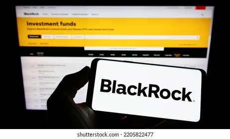 Stuttgart, Germany - 09-18-2022: Person Holding Smartphone With Logo Of US Investment Company BlackRock Inc. On Screen In Front Of Website. Focus On Phone Display. Unmodified Photo.