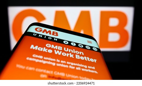 Stuttgart, Germany - 09-19-2022: Smartphone With Website Of British Trade Union GMB On Screen In Front Of Logo. Focus On Top-left Of Phone Display. Unmodified Photo.