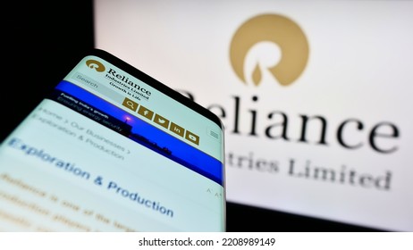 Stuttgart, Germany - 09-22-2022: Smartphone With Website Of Indian Company Reliance Industries Limited On Screen In Front Of Business Logo. Focus On Top-left Of Phone Display. Unmodified Photo.