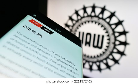 Stuttgart, Germany - 09-30-2022: Mobile Phone With Website Of US Trade Union United Auto Workers (UAW) On Screen In Front Of Logo. Focus On Top-left Of Phone Display. Unmodified Photo.