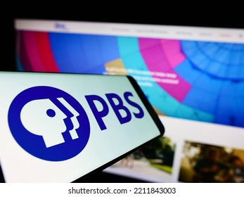 Stuttgart, Germany - 10-01-2022: Smartphone With Logo Of American Tv Network Public Broadcasting Service (PBS) On Screen In Front Of Website. Focus On Left Of Phone Display. Unmodified Photo.