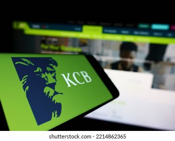 Stuttgart, Germany - 10-03-2022: Smartphone With Logo Of Kenyan Financial Company KCB Group Limited On Screen In Front Of Business Website. Focus On Left Of Phone Display. Unmodified Photo.