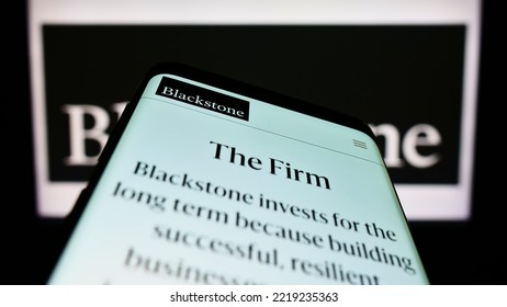 Stuttgart, Germany - 10-14-2022: Mobile Phone With Website Of US Investment Company Blackstone Inc. On Screen In Front Of Business Logo. Focus On Top-left Of Phone Display. Unmodified Photo.