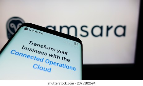 Stuttgart, Germany - 12-11-2021: Smartphone with website of American cloud software company Samsara Inc. on screen in front of business logo. Focus on top-left of phone display. Unmodified photo.