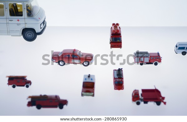 Stuttgart, Germany -15 June, 2014: mini fire\
enginefire truck, scale model vehicle at the Mercedes-Benz\
automobile Museum. White\
background
