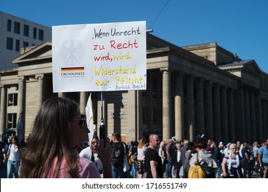 STUTTGART, GERMANY - APRIL 26, 2020: Anti Lockdown Protest In Stuttgart, Held At Schloßplatz. Protestors Claim That The Anti COVID-19 Measures Are Against The Spirit Of The Constitution. 