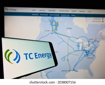 STUTTGART, GERMANY - Aug 16, 2021: Mobile Phone With Logo Of Canadian Company TC Energy Corporation On Screen In Front Of Website  Focus On Center Of Phone Display 