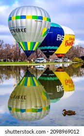 Stuttgart, Germany - December 18: Hot air balloons from the company Stuttgarter Hofbräu, BW-Bank and Stadtwerke in the old town of Stuttgart on December 18, 2021