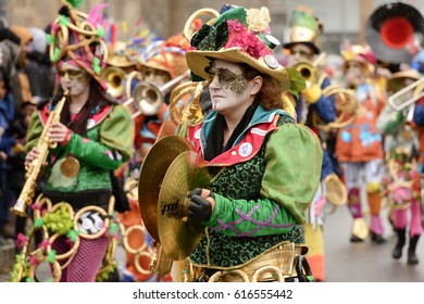 STUTTGART, GERMANY - FEBRUARY 28: Clash Cymbal Player Musician Dressed Up  And Walking As A Marching Band Among Viewers. Shot At  Carnival Parade In City Center On Feb 28, 2017 Stuttgart, Germany
