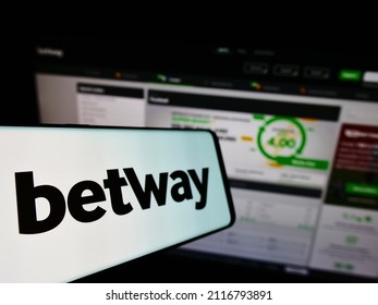 STUTTGART, GERMANY - Jan 09, 2022: Smartphone With Logo Of Sports Betting Company Betway Group On Screen In Front Of Business Website  Focus On Left Of Phone Display 