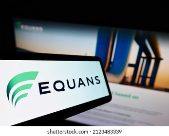 STUTTGART, GERMANY - Jan 09, 2022: Mobile Phone With Logo Of French Facility Management Company EQUANS On Screen In Front Of Business Website  Focus On Left Of Phone Display 