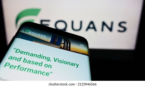 STUTTGART, GERMANY - Jan 09, 2022: Smartphone With Webpage Of French Facility Management Company EQUANS On Screen In Front Of Business Logo  Focus On Top-left Of Phone Display 